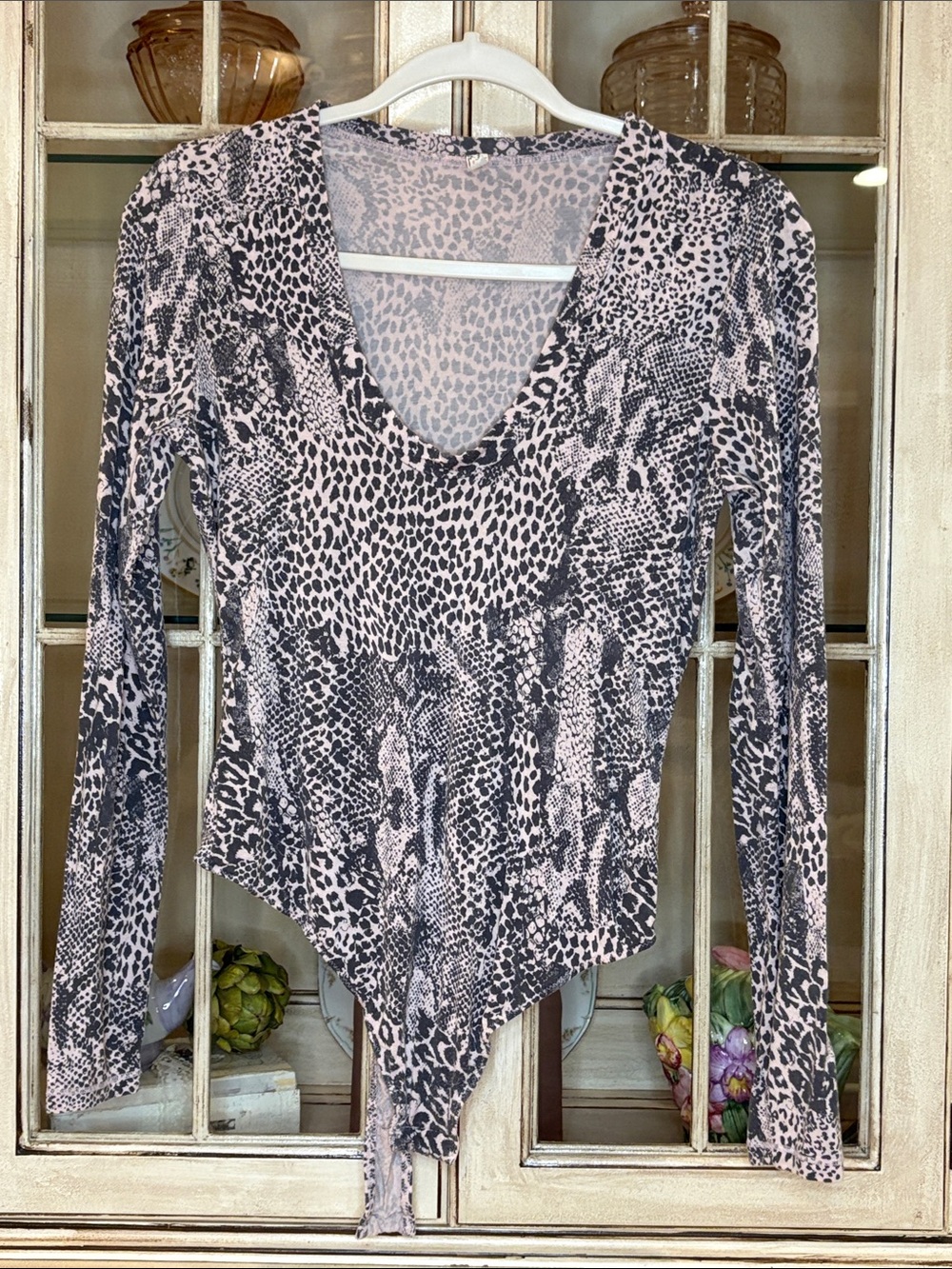 Free People Long-Sleeve, super soft, Animal Print Bodysuit in Blush and Black